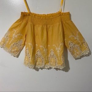 Off shoulder top with embroidery and lace trim